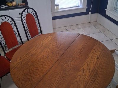 Vintage Round Wood Dining Table with 4 Chairs Iron Scroll Back