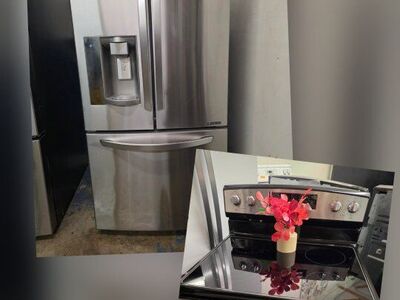 LG 33" REFRIGERATOR AND AMANA ELECTRIC STOVE