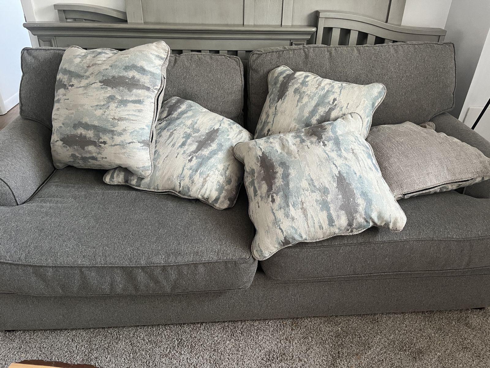 Haverty’s Gray Fabric Upholstered Sofa Couch with Decorative Accent Pillows