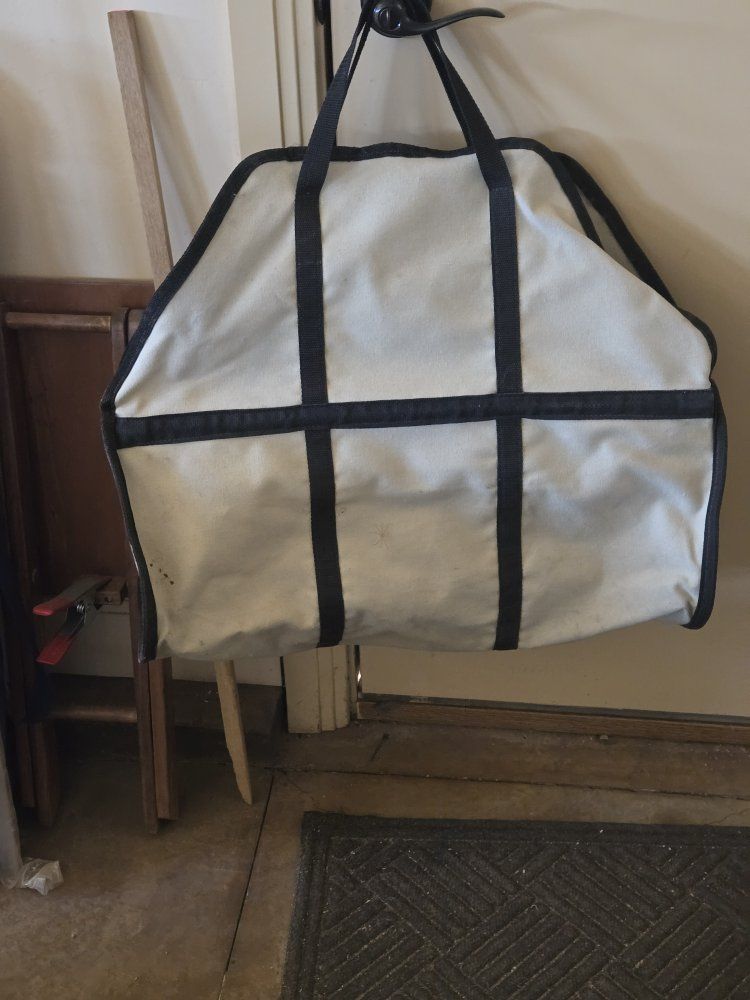 Firewood carrier bag with handles