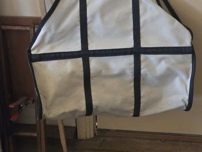 Firewood carrier bag with handles