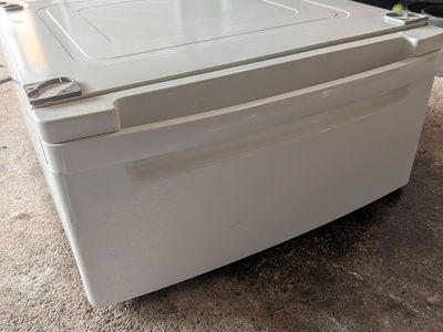 LG 27" pedestal for washer/dryer. Used, fair condition white