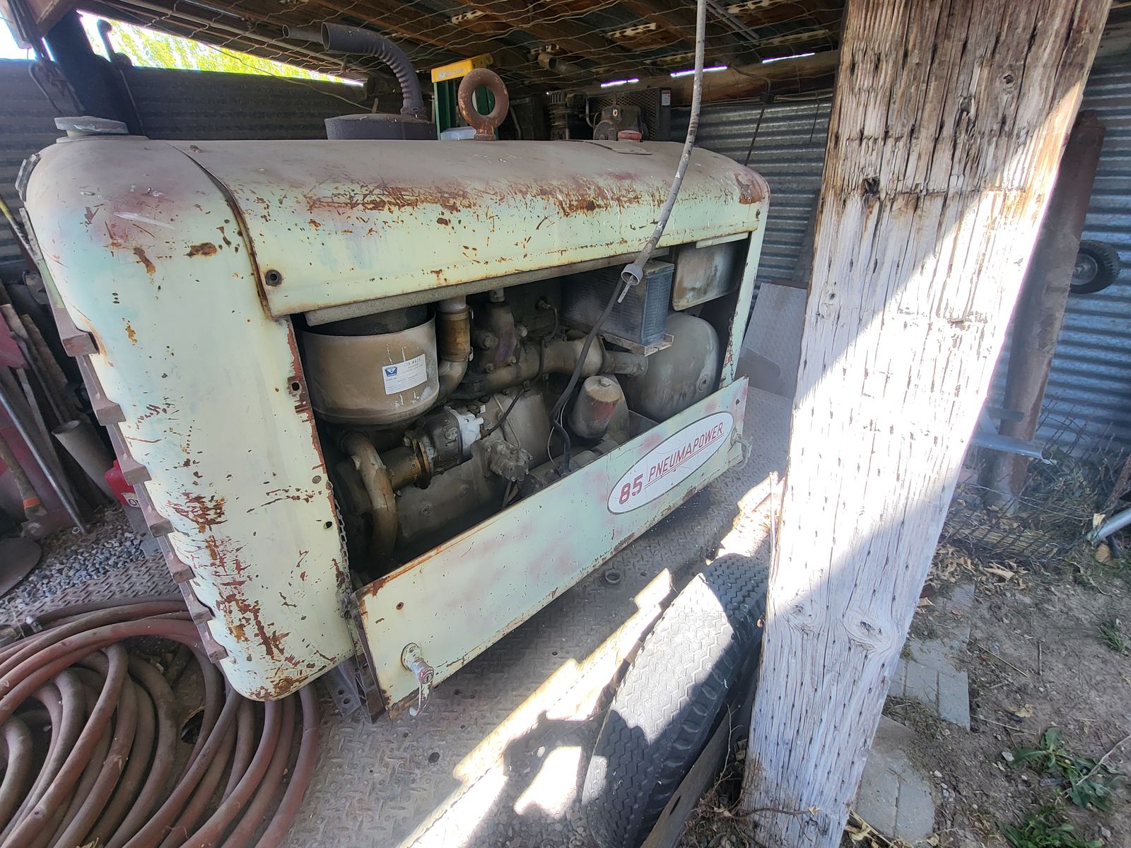 Gasoline powered sandblaster and compressor