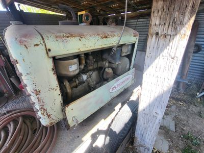 Gasoline powered sandblaster and compressor