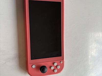 Nintendo Switch Lite Coral Handheld Gaming Console UsedExcellent