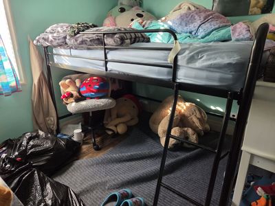 Youth bed with ladder and play area