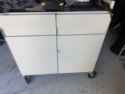 one metal cabinet with wheel and elctrical