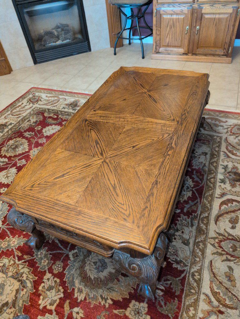 Oak Coffee Table with Ball and Claw Feet and Carved Details