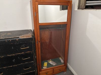 Wooden Gun Cabinet with Glass Door and Storage Drawers - Ideal for Display. Located in Ogden. Will be here until 230 today.