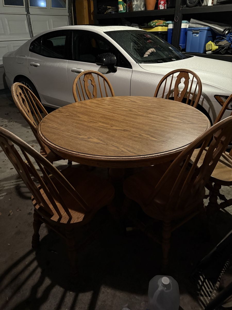 Solid oak table with 6 chairs