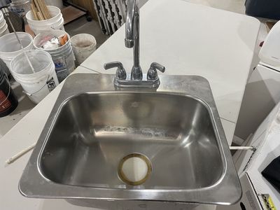 Stainless steel sink with faucet