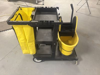 Brand new janitor/maid cart with 35 qt down press mop system