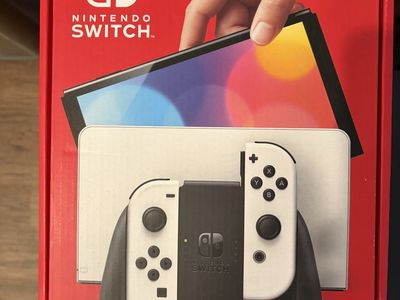 Nintendo Switch OLED Console Bundle w/ 2 Games & Pikachu Carrying Case