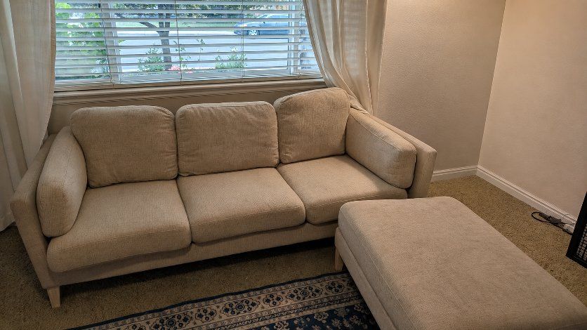 Beige Upholstered 3-Seater Couch Sofa with Ottoman - Modern Design, good condition.