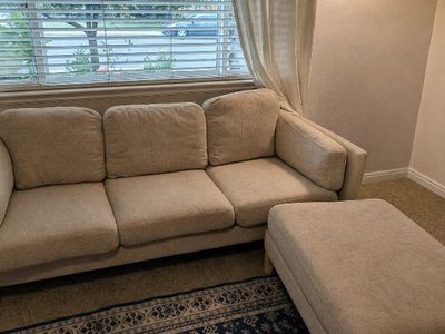 Beige Upholstered 3-Seater Couch Sofa with Ottoman - Modern Design, good condition.