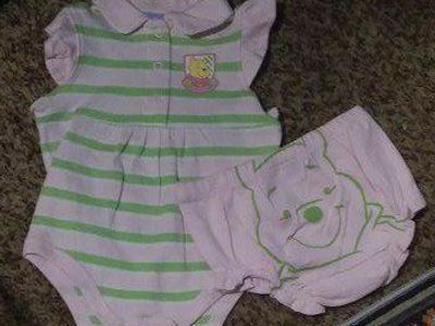 2 PIECE WINNIE THE POOH SUNSUIT .6-9 MOS.
