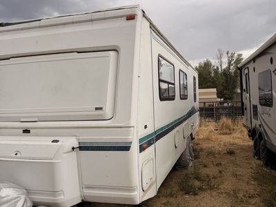 30’ Fleetwood trailer.