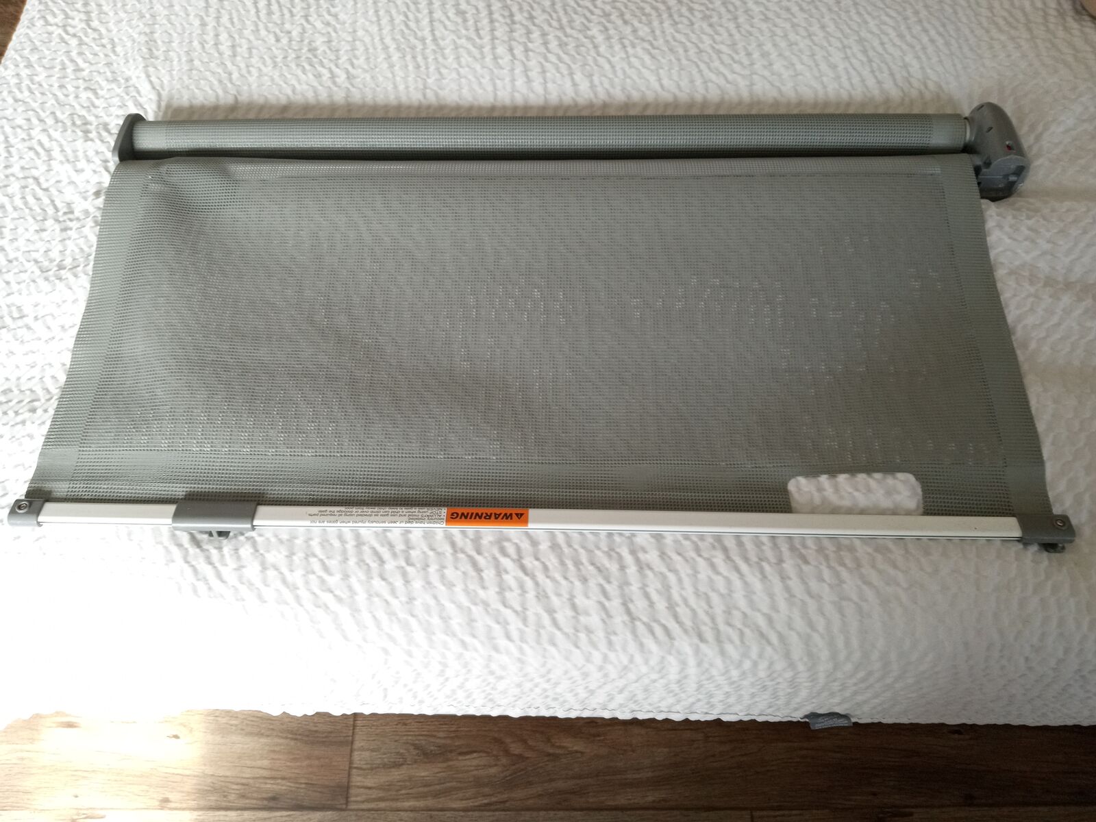 Retractable baby or animal safety gate