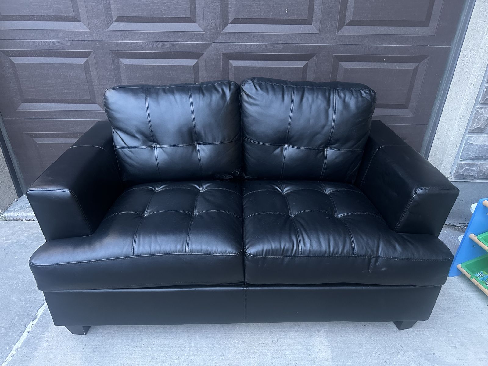 Black Leather Loveseat