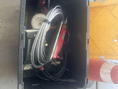 Milwaukee Concrete Grinder - Heavy-DutyMilwaukee Hammer Drill, Auto body tool, winch cable and misc tools.