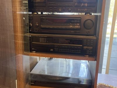 Kenwood stereo with CD, Casette player and record player.