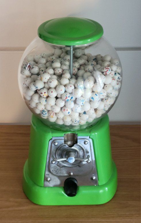 Vintage Green Gumball Machine Filled With Gumballs