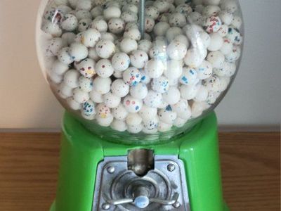 Vintage Green Gumball Machine Filled With Gumballs