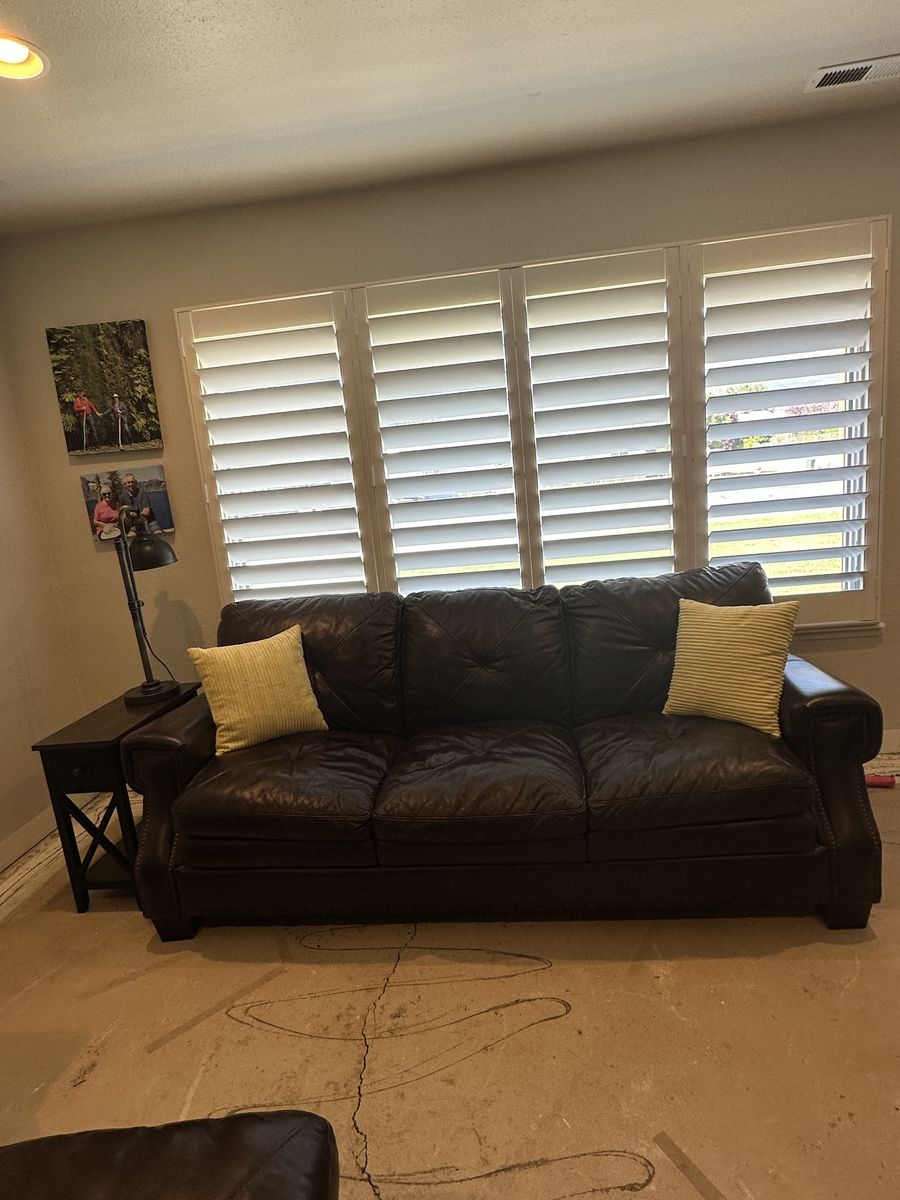 Leather couch, chair and ottoman