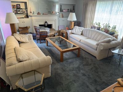 Vintage Cream Channel-Tufted Sofa with Rolled Arms and Matching Pillows