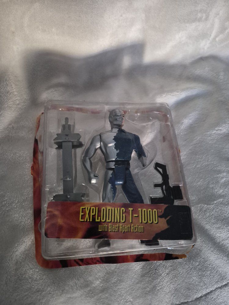 Vintage Exploding T-1000 Terminator 2 Action Figure with Blast Apart Action ToyBiz