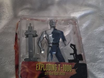 Vintage Exploding T-1000 Terminator 2 Action Figure with Blast Apart Action ToyBiz