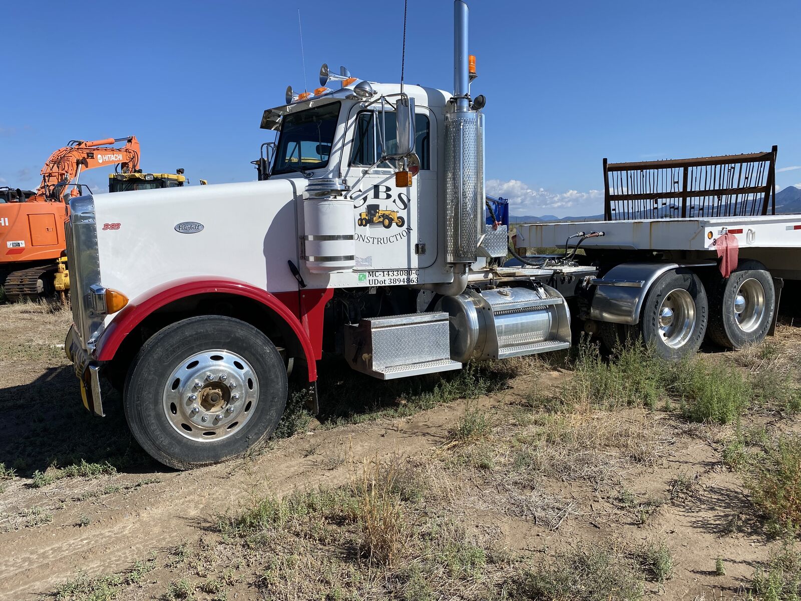 2000 Peterbuilt 385 W/ Dump and Flat Trailer