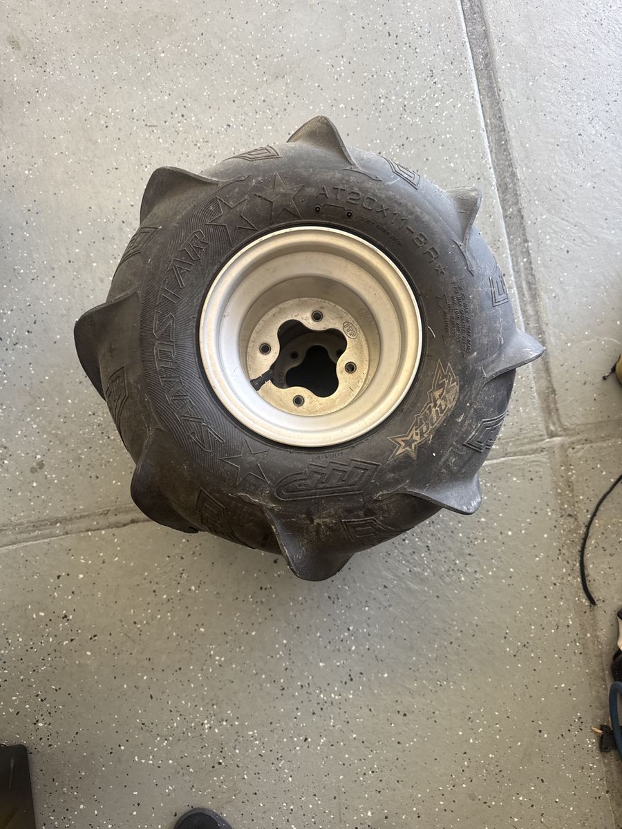 Used ITP rims with paddle tires 20 x 11 x 8