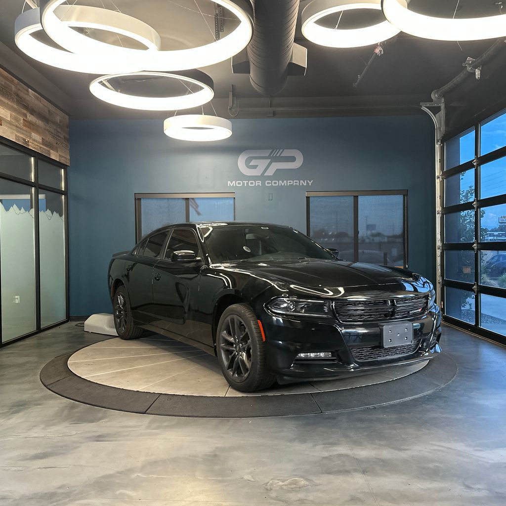 2023 Dodge Charger SXT — rebuilt & branded title, 12% below market