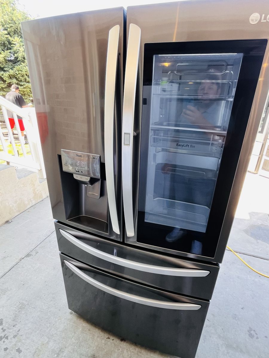 $950 OBO GOOD FRIDGE LG BLACK STAINLESS STEEL DOOR IN DOOR