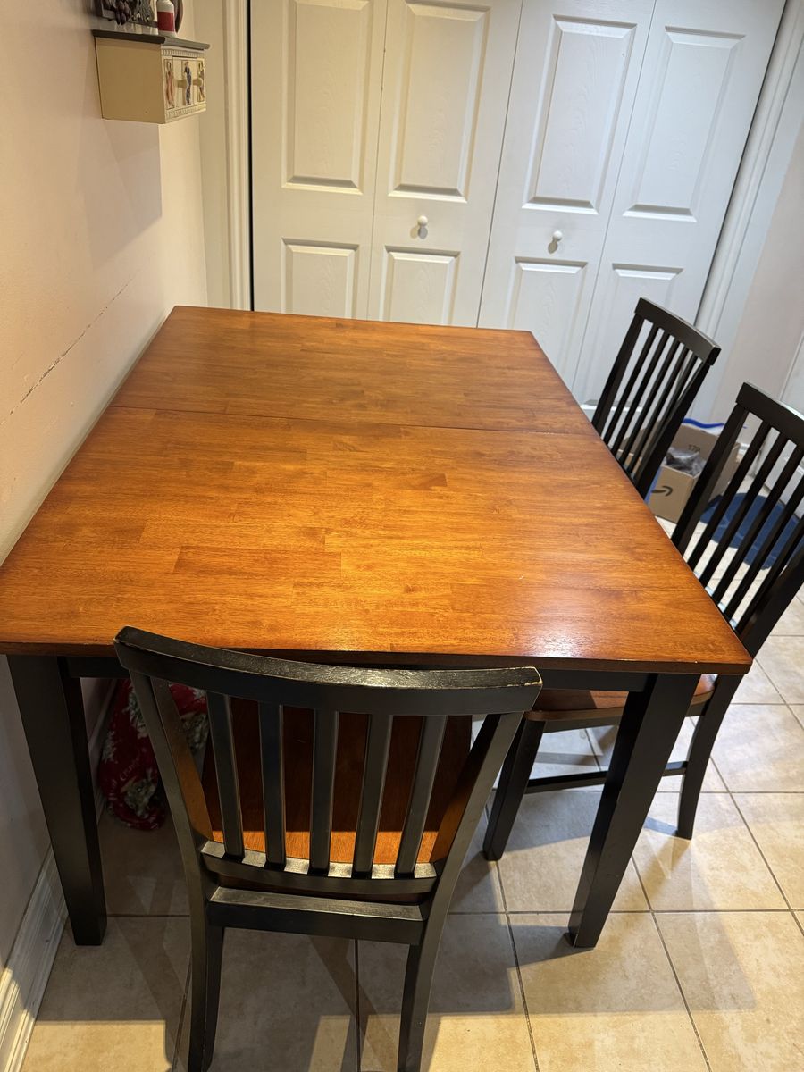 Dining Table and 6 Chairs - Extendable Wood Top, Black Legs, Compact Design