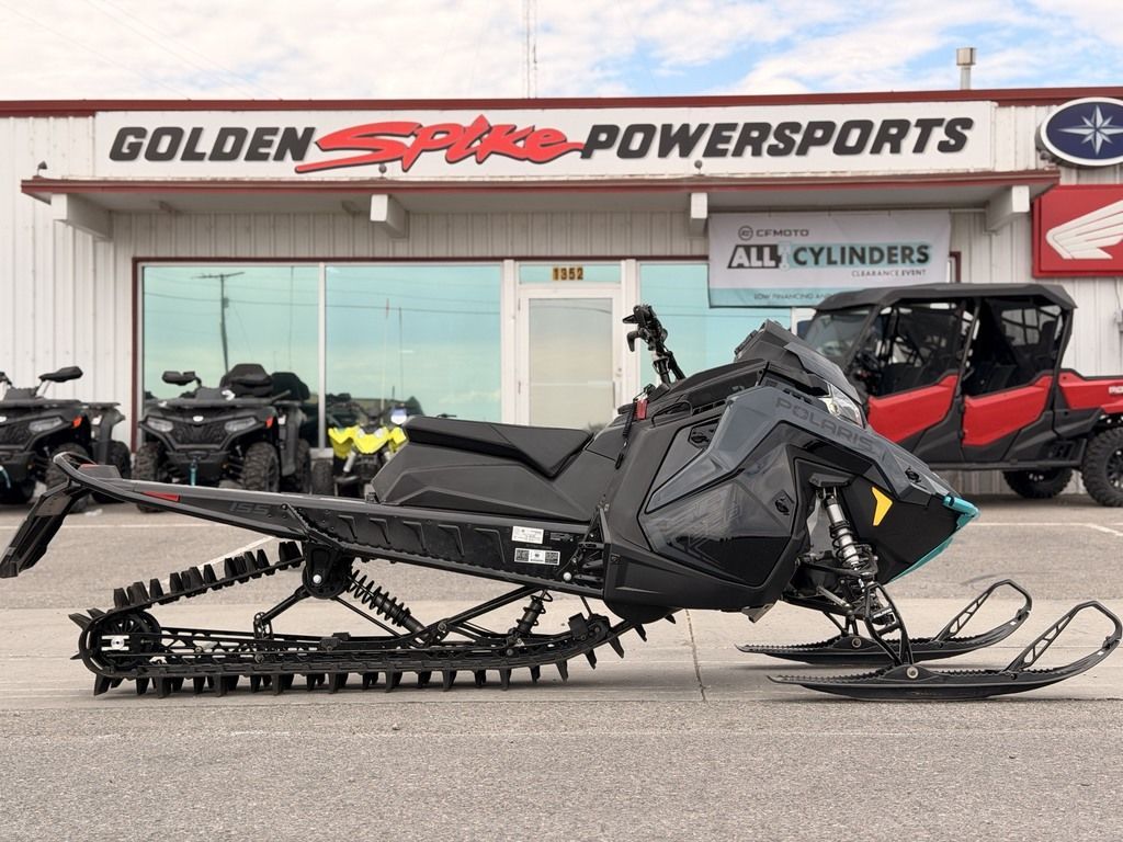 2026 Polaris® 650 RMK SP 155 Gloss Black / Blue Dusk