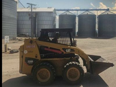 Skidsteer and 7x14' dump trailer