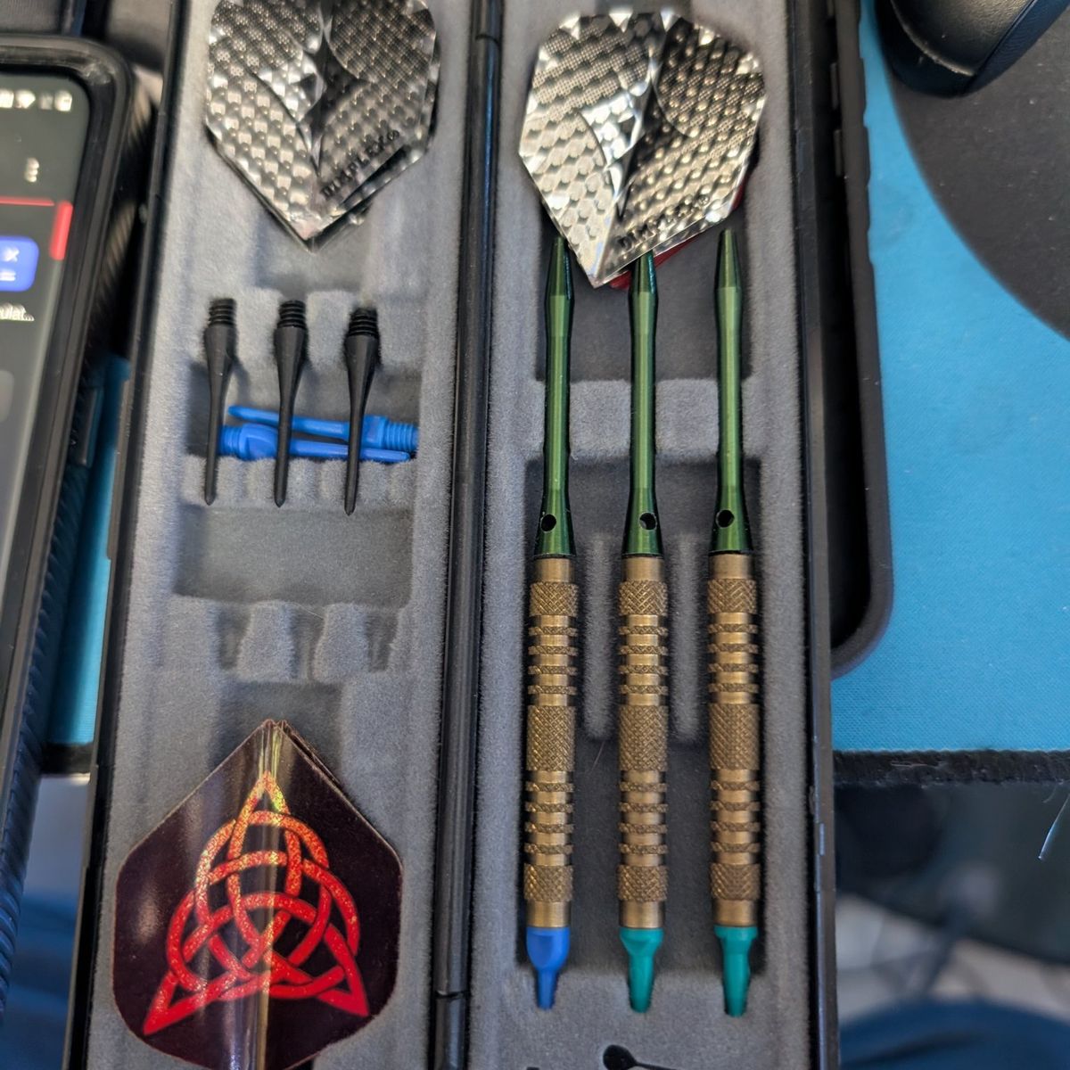 darts for playing on a dart board