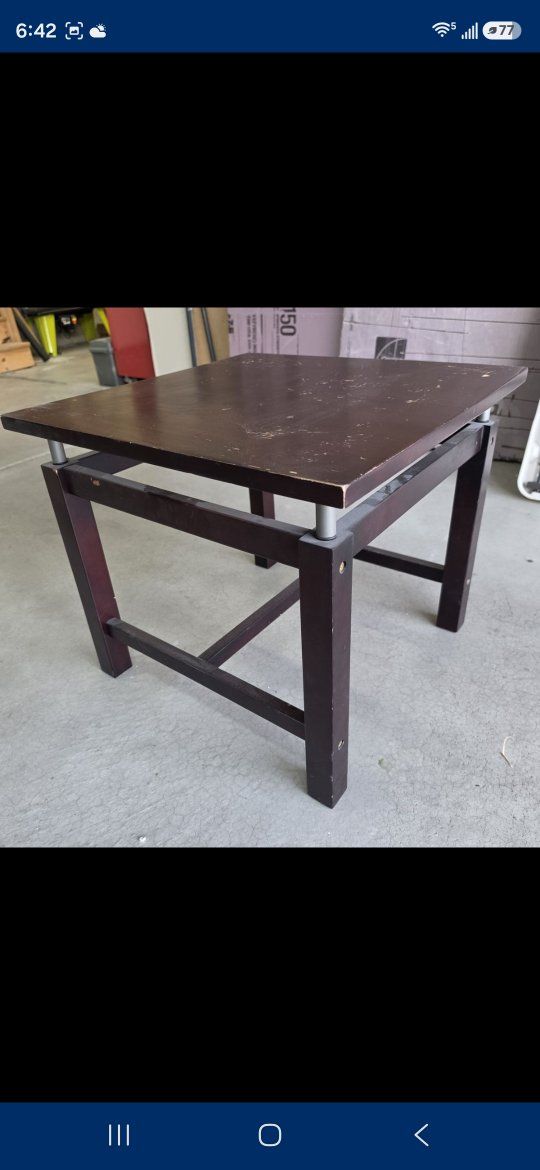 Dark Brown Wooden Coffee Table with Square Top and Metal Accent Pegs