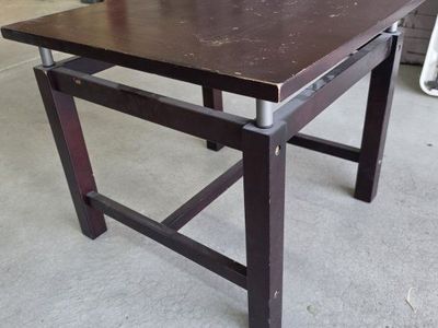 Dark Brown Wooden Coffee Table with Square Top and Metal Accent Pegs