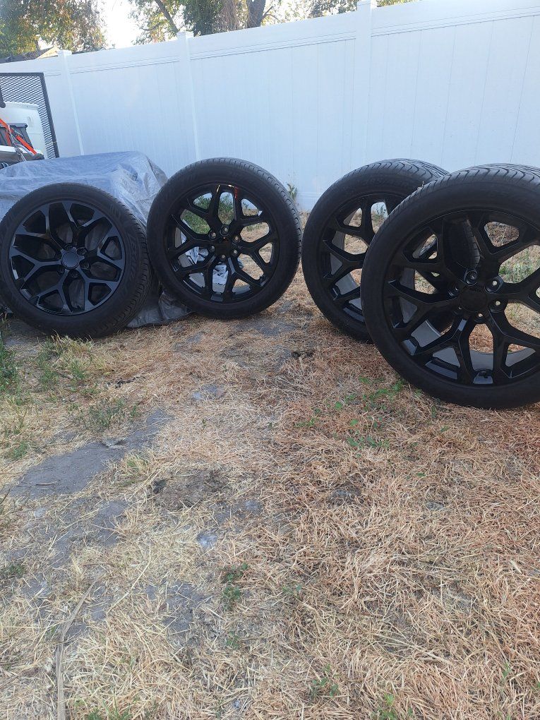 Set of 4 Black 22-inch Aftermarket Wheels and Tires 285/45R22 - Excellent Condition