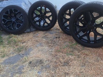 Set of 4 Black 22-inch Aftermarket Wheels and Tires 285/45R22 - Excellent Condition