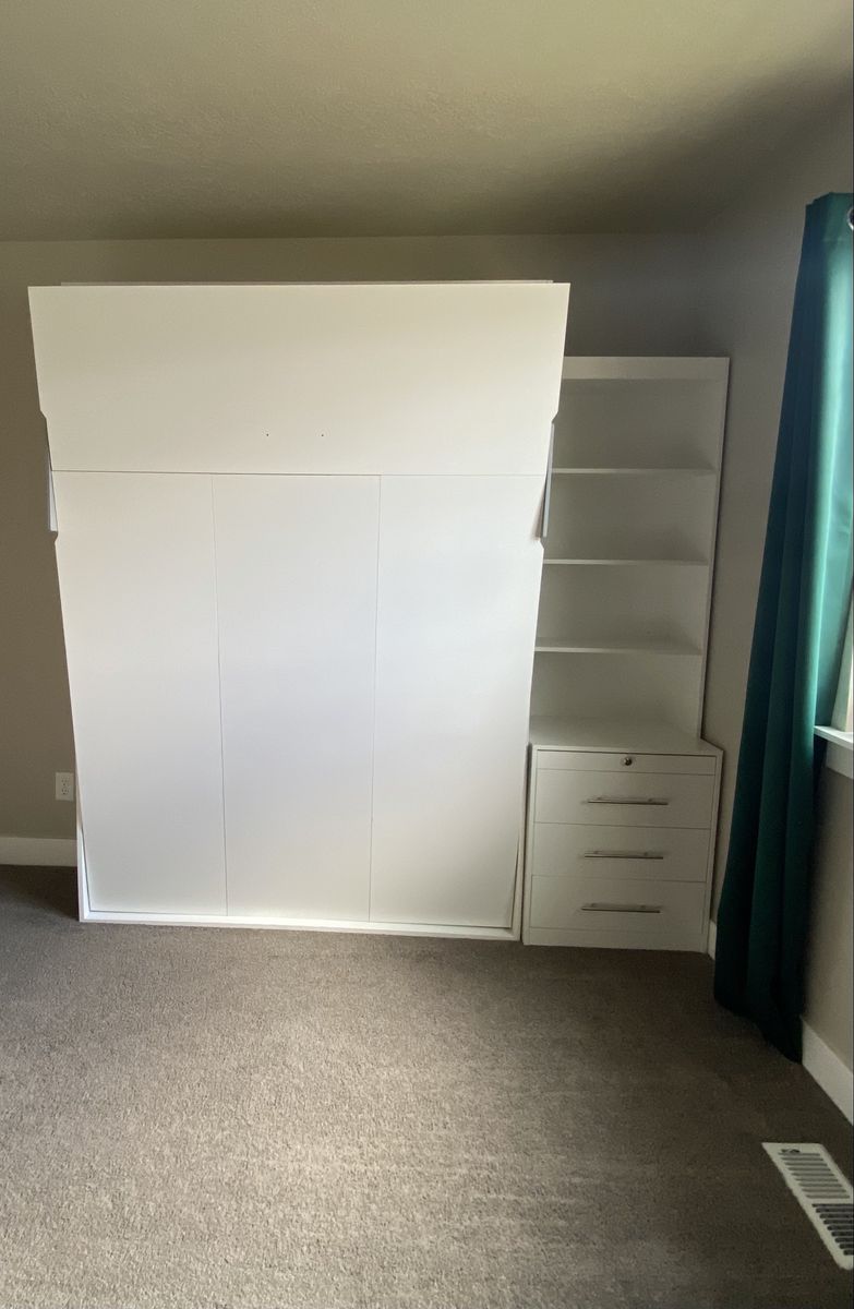 Full size white Murphy bed