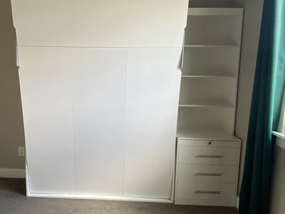 Full size white Murphy bed