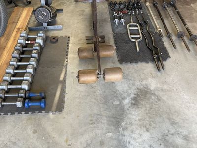 Weight bench, weights, and dumbbells
