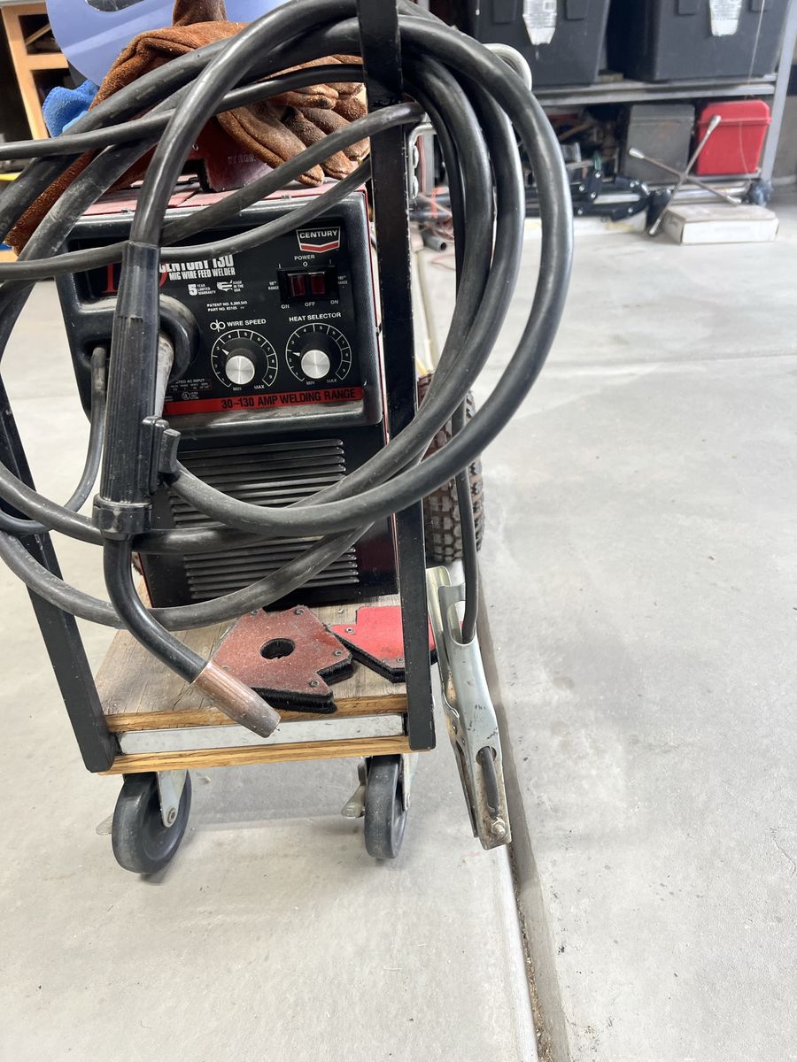 Century 130 MIG Wire Feed Welder (30-130 Amp) with Cart, & Accessories