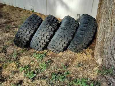 35x12.50x15 super swampers and rims