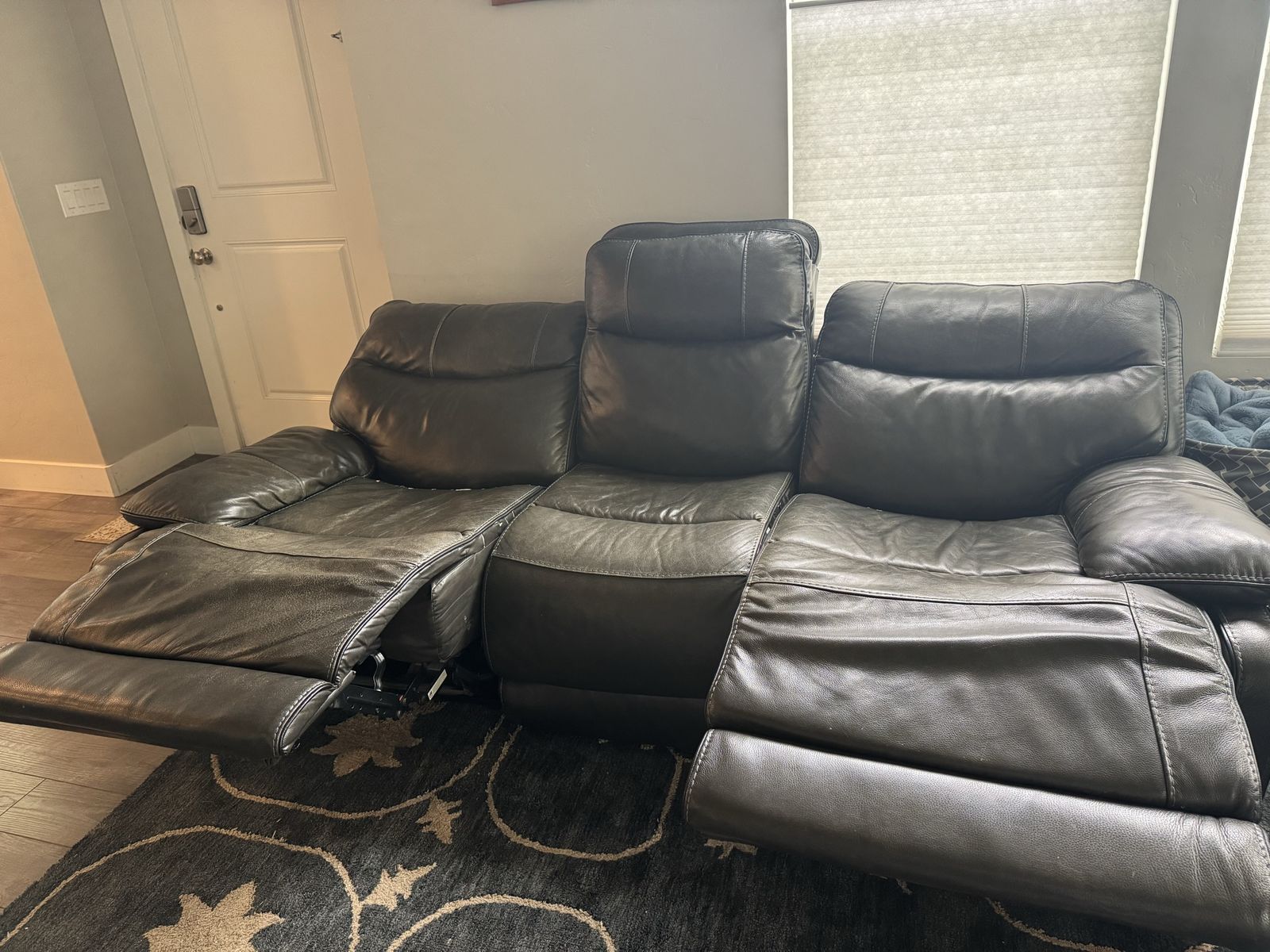Dark Gray Leather Reclining Sofa and Loveseat Set