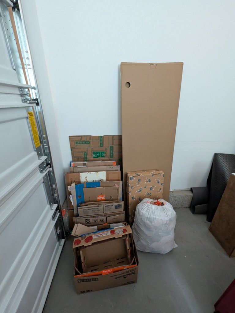 Assorted Cardboard Boxes and Packing Materials for Moving or Storage